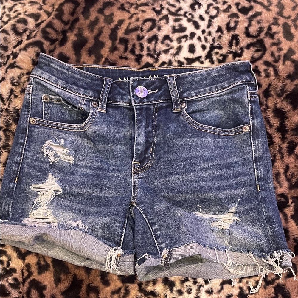 American Eagle Outfitters Ripped Blue Midi Jean Shorts